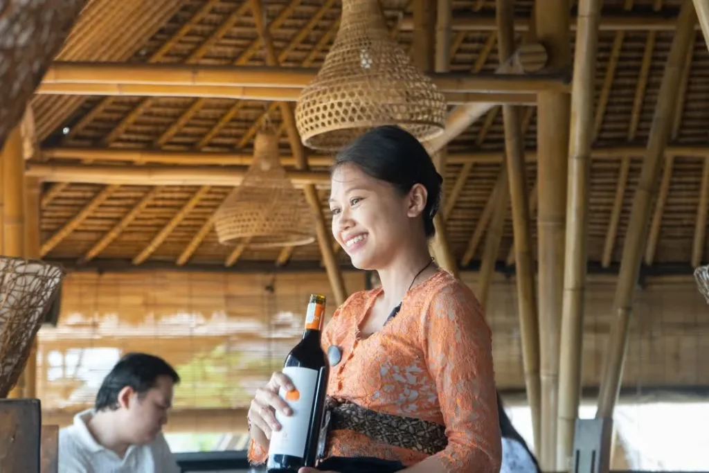 As the sun begins to set over Ubud’s lush green landscapes, there’s no better place to unwind than at the Tropical Sunset Bar at Tebasari. Blending nature’s serenity with a touch of sophistication, this hidden gem offers guests an unforgettable Bali lounge experience surrounded by rice terraces, soft music, and the golden hues of the island’s sunset. Whether you’re here for handcrafted cocktails, chill ambiance, or scenic views, the Tropical Sunset Bar is designed to be your perfect escape in Bali. The Essence of the Tropical Sunset Bar at Tebasari Located within the tranquil grounds of Tebasari, the Tropical Sunset Bar captures the true spirit of Bali vibrant, natural, and effortlessly relaxing. The bar overlooks the iconic rice paddies of Tegallalang, offering guests a panoramic view that pairs beautifully with refreshing island-inspired drinks. From cozy seating areas to bamboo details and warm lighting, every corner of the bar has been thoughtfully designed to create a luxurious yet laid-back vibe, perfect for both romantic evenings and friendly gatherings. Signature Cocktails with a Balinese Twist At the heart of the Tropical Sunset Bar experience are its signature cocktails a creative fusion of tropical fruits, herbs, and locally crafted spirits. Skilled mixologists at Tebasari use fresh ingredients like lemongrass, coconut, and lime to craft drinks that embody Bali’s natural flavors. Favorites include: Tebasari Sunset – A stunning orange-hued cocktail made with pineapple, arak Bali, and grenadine, inspired by the beauty of Ubud sunsets. Coconut Paradise – A creamy and refreshing blend of coconut cream, rum, and pandan essence. Tropical Mojito – A classic with a Balinese touch, featuring mint, lime, and locally sourced honey. Passionfruit Bliss – A sweet-and-tart delight that perfectly complements the island’s tropical breeze. Each drink tells a story one of Bali’s nature, creativity, and joy. A Scenic Setting for Every Occasion and Tropical Sunset Bar The Tropical Sunset Bar at Tebasari is more than a bar it’s a destination. Whether you’re celebrating a special evening or simply relaxing after exploring Ubud, the open-air layout and soft lighting create a magical atmosphere as day turns into night. Guests can enjoy their drinks while listening to gentle acoustic music or the natural sounds of the surrounding landscape. The bar also offers cozy lounge spots for couples and larger tables for groups, making it the ideal space for both romance and connection. Pairing with Tebasari’s Culinary Excellence No visit to Tebasari would be complete without pairing your cocktail with the restaurant’s exceptional cuisine. The Tebasari Bar and Lounge menu features a variety of bites and dishes inspired by Balinese and international flavors from crispy duck sliders to grilled seafood and tropical desserts. This perfect combination of fine dining and premium cocktails makes the Tropical Sunset Bar a must-visit for anyone seeking a full sensory experience in Bali. The Tebasari Experience Nature, Flavor, and Warmth What makes the Tropical Sunset Bar truly special is the Tebasari spirit behind it a blend of hospitality, artistry, and love for nature. Every guest is welcomed with genuine Balinese warmth, and every drink or dish is crafted to reflect the beauty of the island. As the sky turns shades of orange and pink, and lanterns begin to glow, you’ll understand why Tebasari has become one of Bali’s most enchanting destinations for sunset lovers and cocktail enthusiasts alike. Unwind and Embrace the Bali Sunset If you’re looking for a place to relax, sip, and soak in Bali’s golden hour, the Tropical Sunset Bar at Tebasari is the perfect spot. With its lush surroundings, signature cocktails, and authentic Balinese charm, it’s not just a bar it’s a sanctuary where time slows down, and every moment feels like paradise.